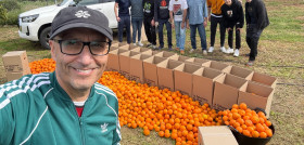 Lextransport dona 500 kg de naranjas y un cheque solidario al banco de alimentos de asturias